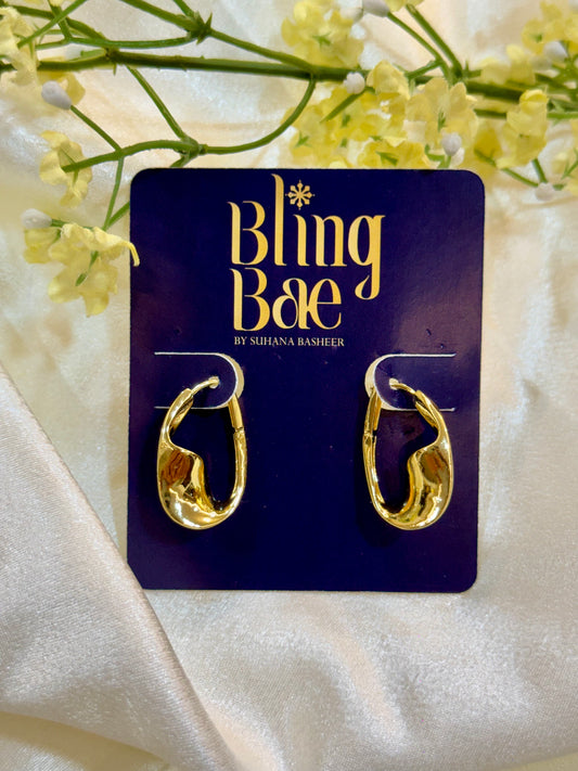 Wavy Gold Huggie Hoops