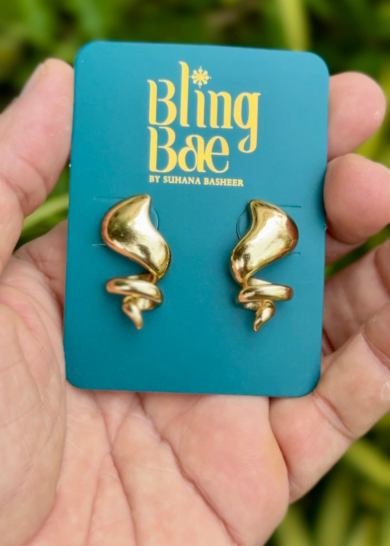 Golden Twirl Stud Earrings