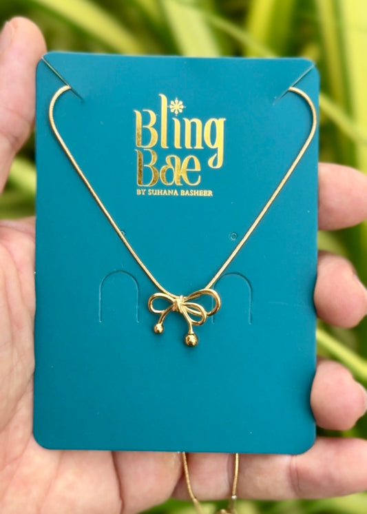 Golden Ribbon Grace Necklace 🎀✨ (316L Grade)
